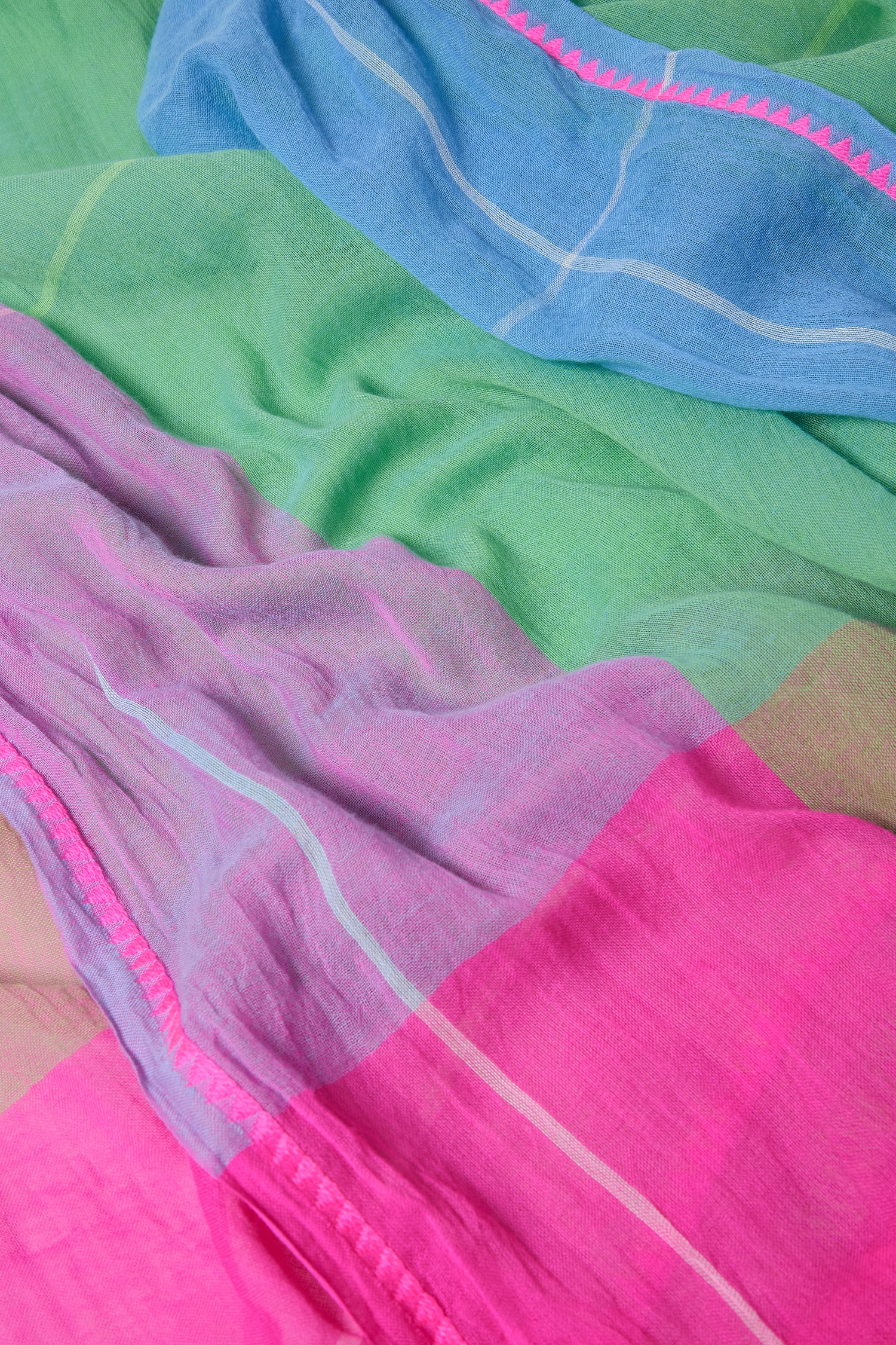 A close-up of the Embroidered Colour Pop Check Cotton Scarf, a lightweight, sheer accessory with embroidered sections in pink, purple, green, and blue, featuring visible stitching and a fine texture.