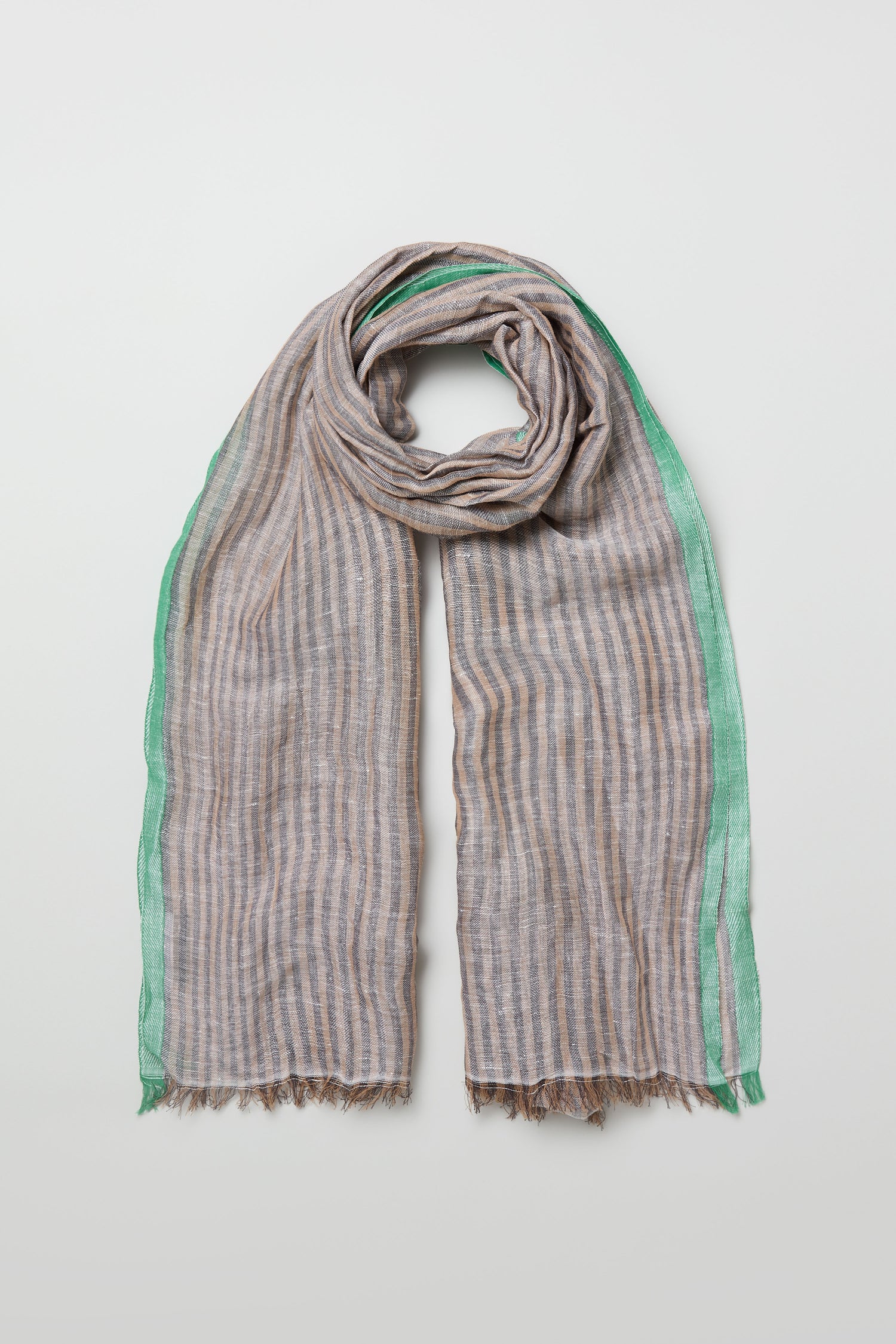 The Spearmint Trim Soft Stripe Scarf is a lightweight accessory featuring neutral stripes, spearmint trim, and fringed edges, displayed flat on a white background.