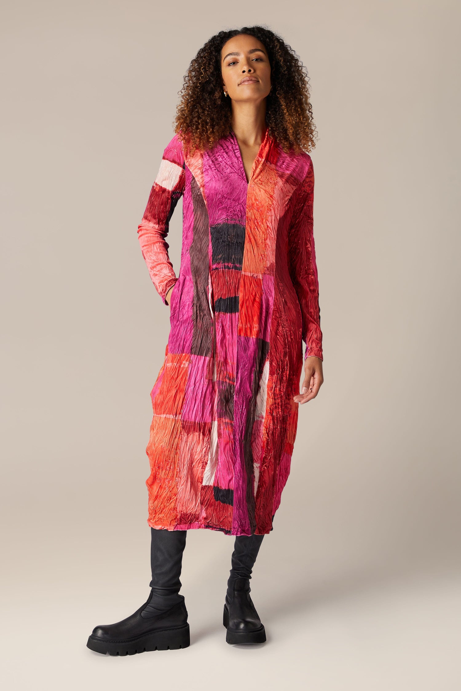 A woman wearing a Block Velvet Dress.