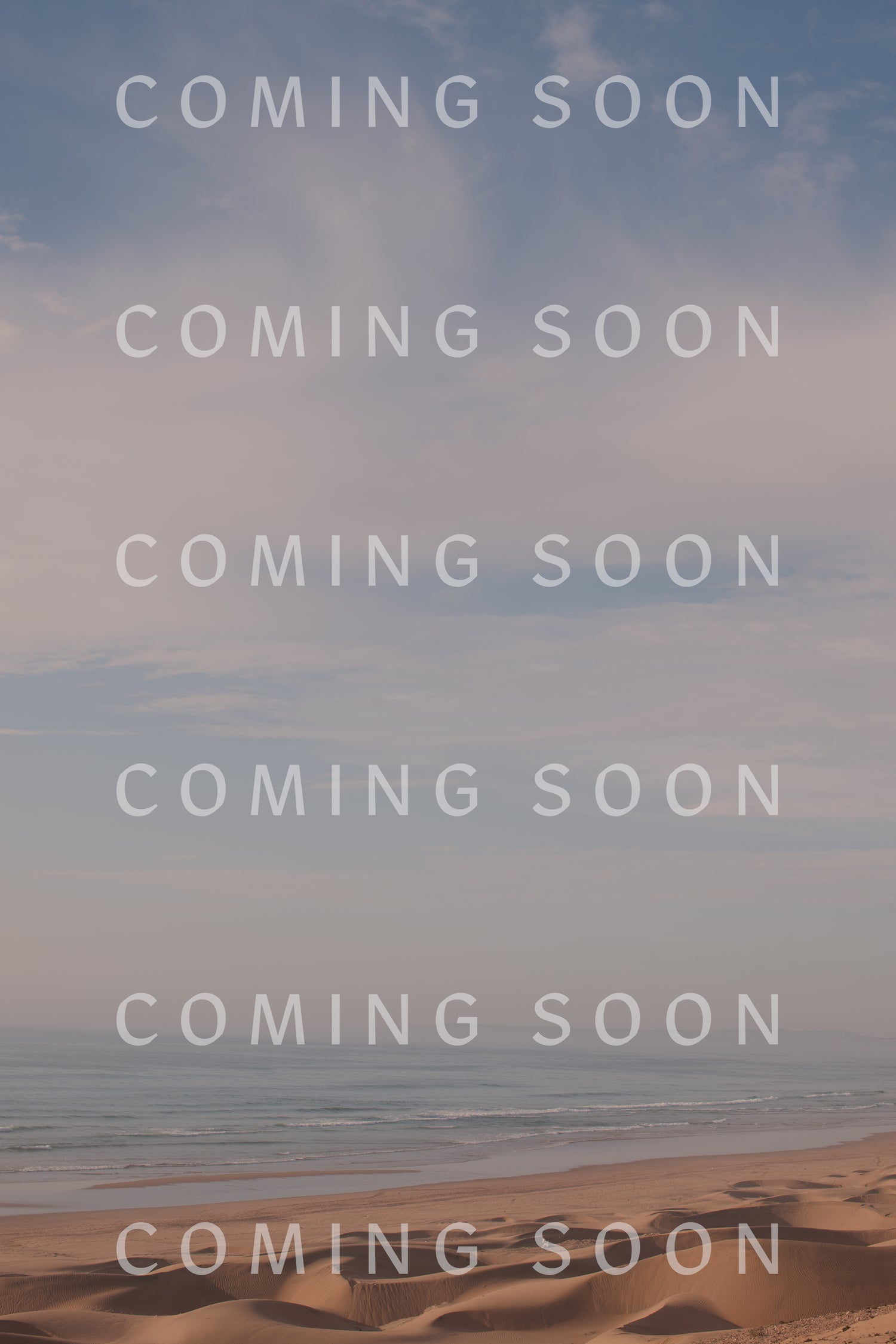 A relaxed sand beach featuring Cotton Jersey Relaxed Tops with the words "coming soon.