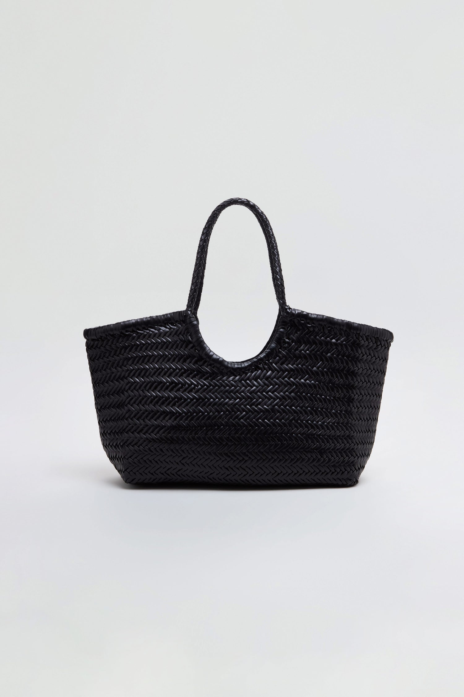 Nantucket Woven Black Leather Bag with two handles, expertly crafted from handwoven buffalo calf leather, displayed against a plain light gray background.