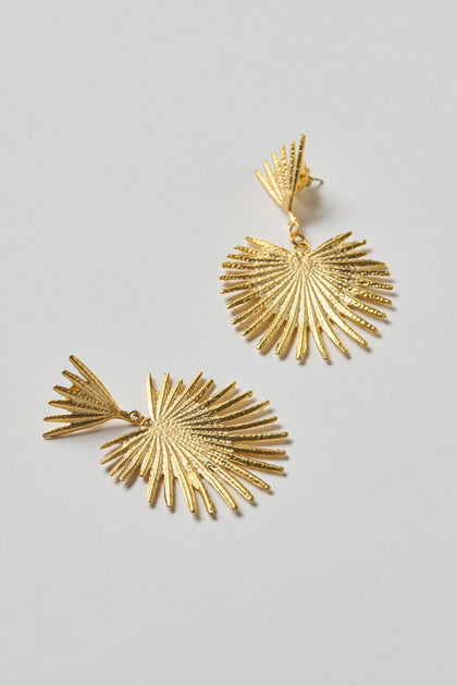 Gold Plated Stargazer Earrings featuring a fan shape with textured, radiating spikes are displayed on a light gray surface—stylish statement earrings for any occasion.