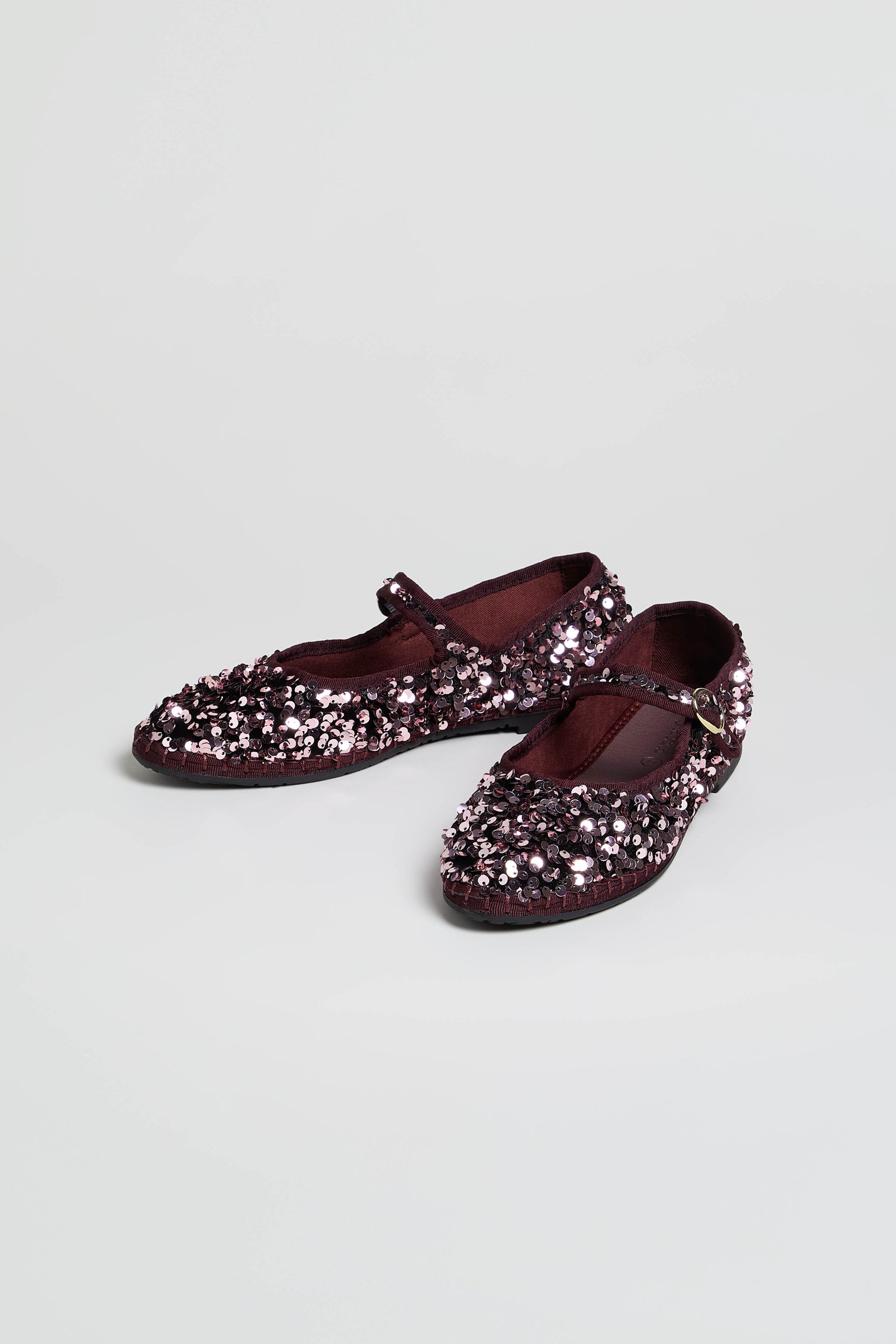 Sequin Mary Jane Shoes in maroon, handmade in Spain and embellished with sparkling sequins and beads, shown against a simple light background.