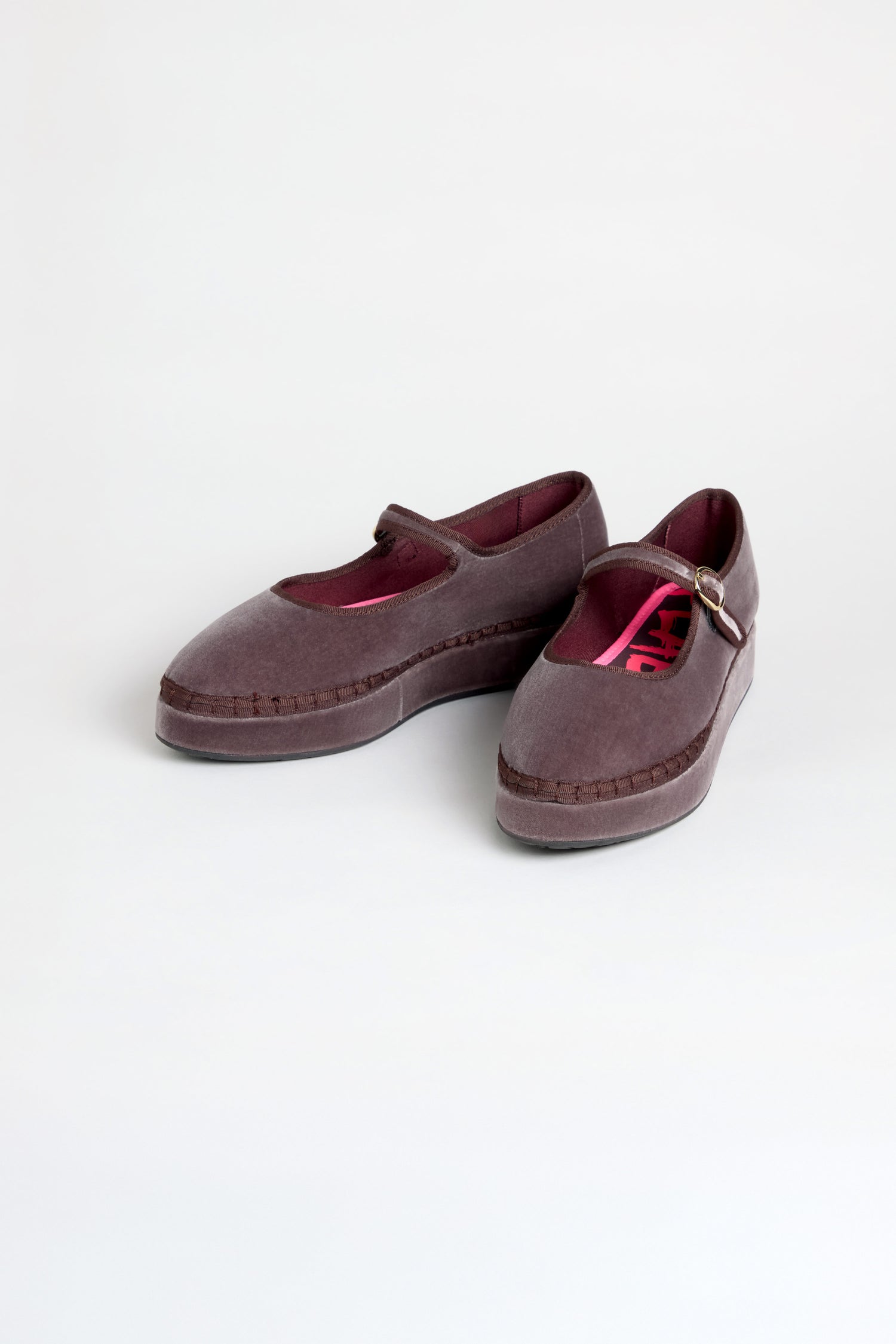A pair of Taupe Velvet Platform Mary Jane Shoes, featuring a single strap and buckle, with a soft cotton velvet upper, handmade in Spain and displayed on a plain light background.