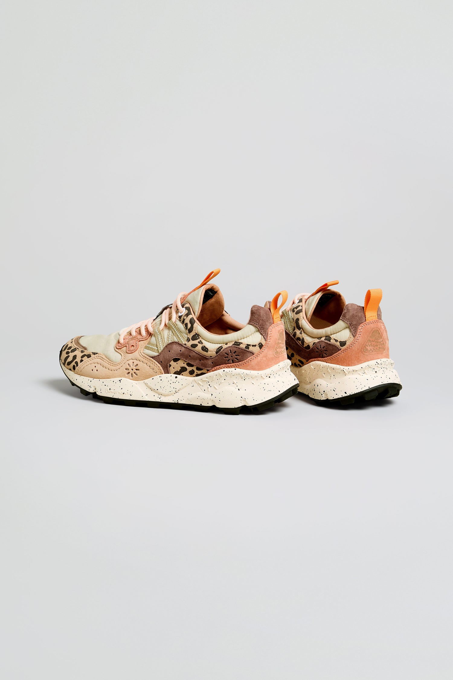 A pair of beige, brown, and orange Yamano 3 Cheetah Detail Trainers featuring suede uppers, speckled soles, and cheetah pattern accents, displayed on a light gray background.