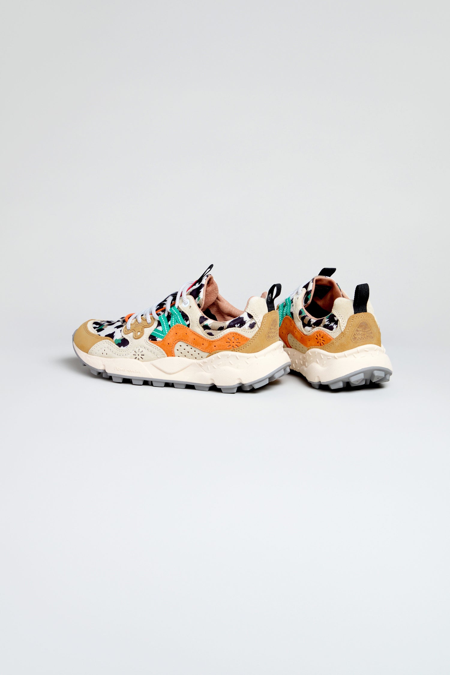 The Yamano 3 Leopard Suede Nylon Trainers feature multicolored floral and animal patterns, tan and orange accents, and a lightweight rubber sole, showcased on a plain light background.
