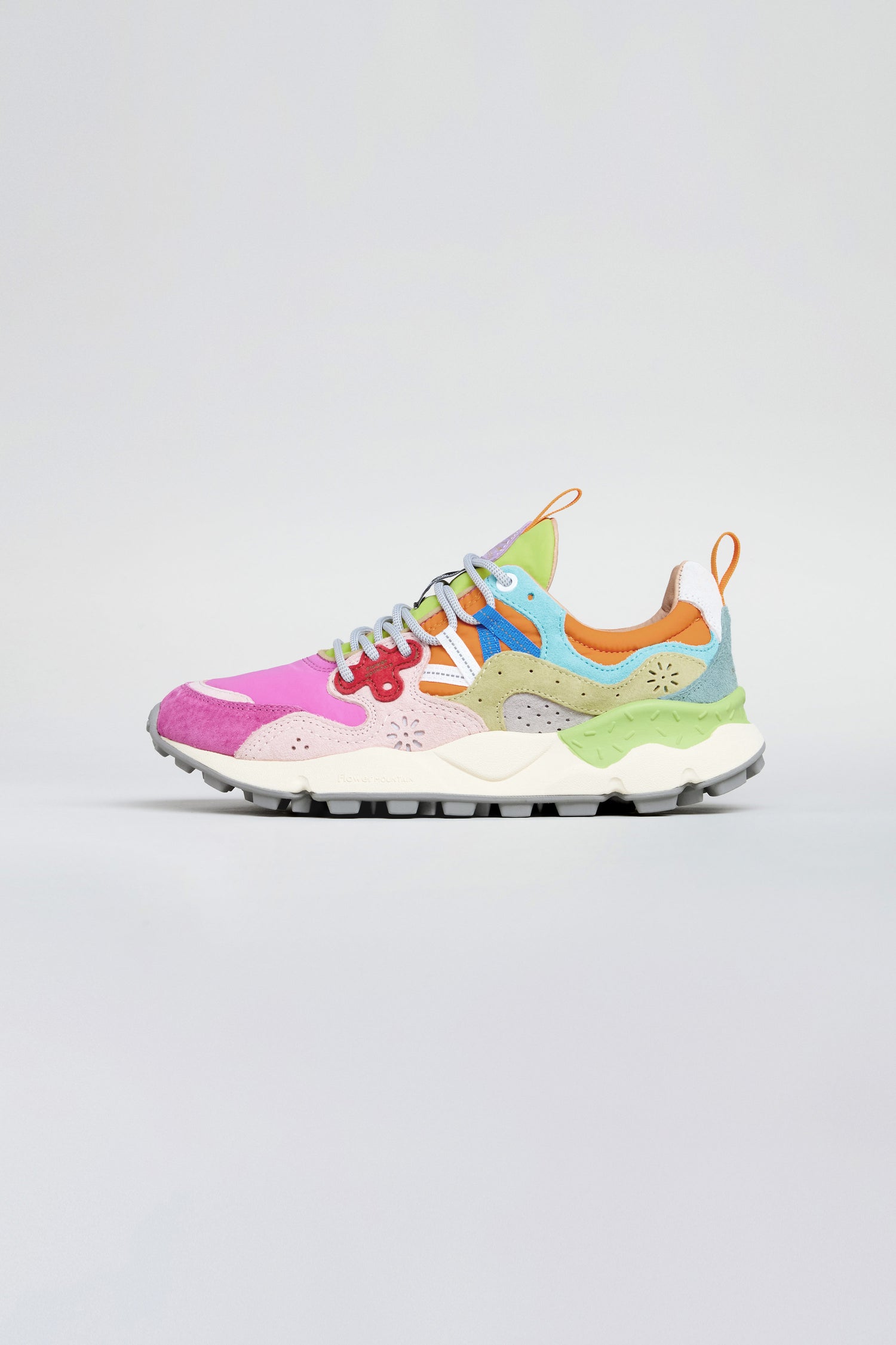 The Fuchsia Yamano 3 Colour Pop Trainers are women's outdoor sneakers featuring pink, purple, green, blue, and orange accents, white laces, a chunky sole, and mixed suede/fabric materials—shown in side profile and ideal for trekking.