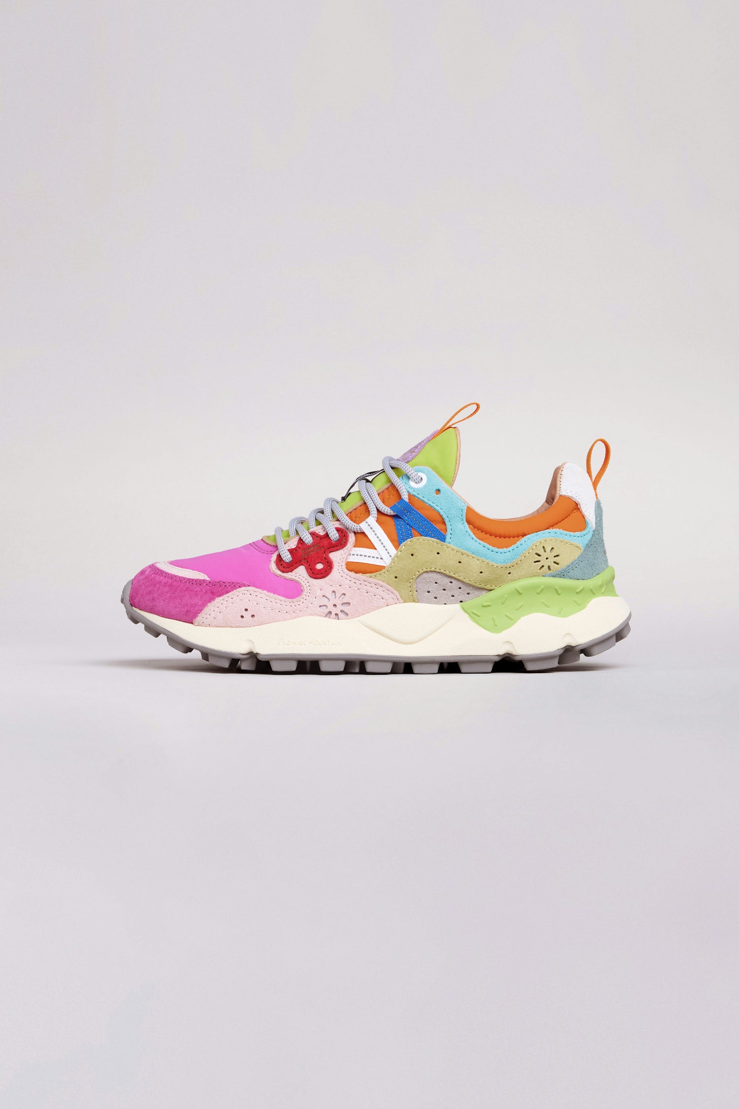The Fuchsia Yamano 3 Colour Pop Trainers are vibrant women's outdoor sneakers with pink, blue, green, yellow, and orange patterns on white—ideal for stylish trekking.