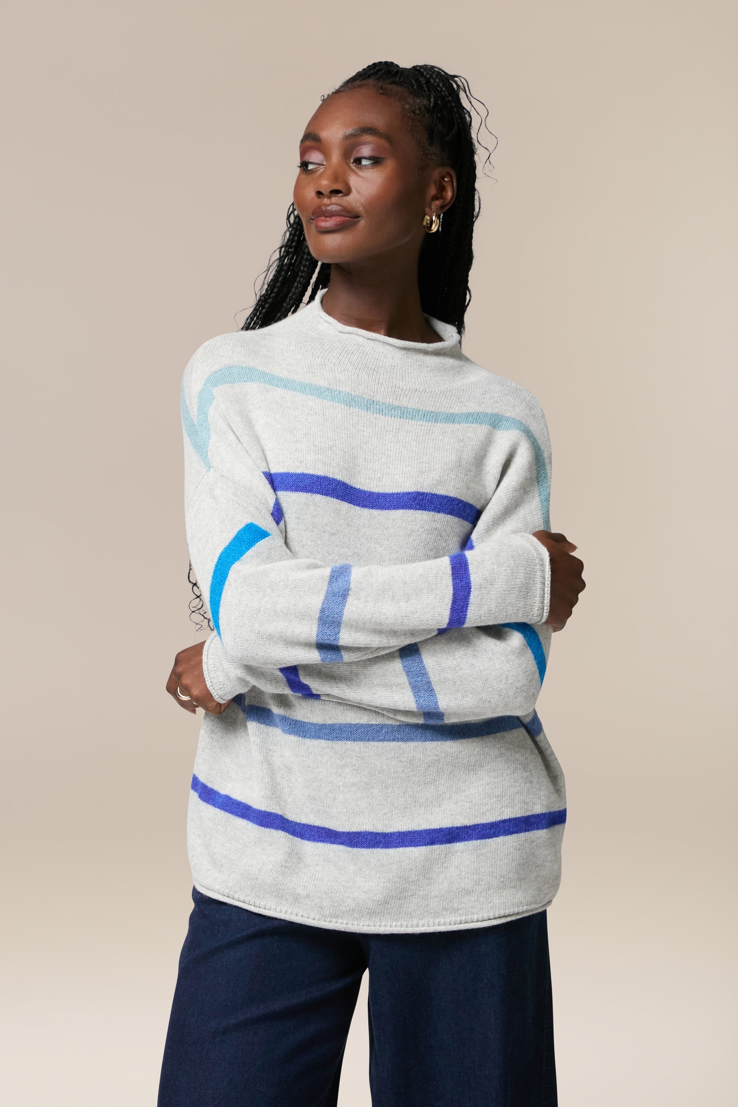 A woman wearing a Mohair Blend Stripe Sweater.