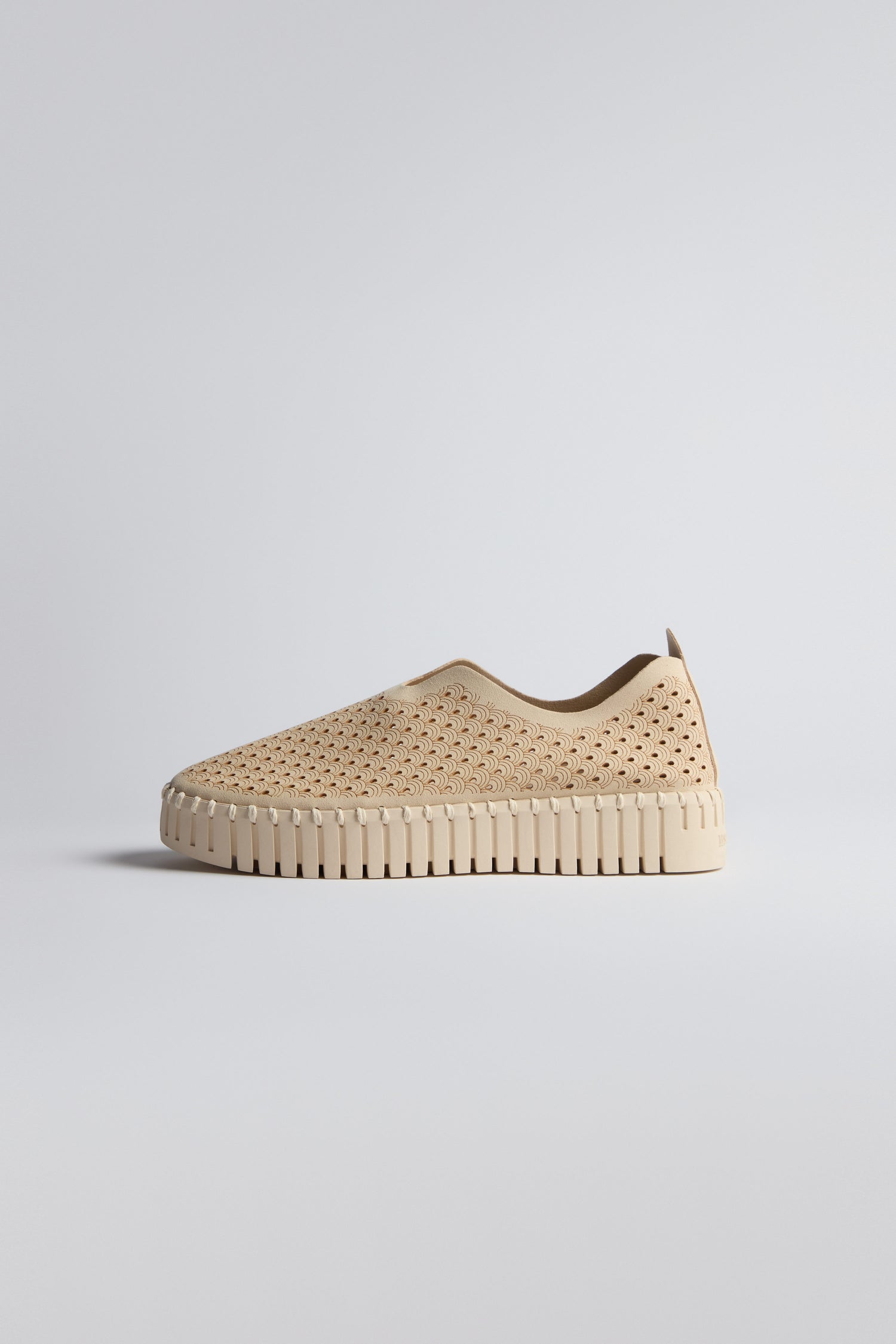Beige Tulip Slip On Shoes by Ilse Jacobsen, featuring a perforated upper and thick platform sole, shown in profile against a plain light background.