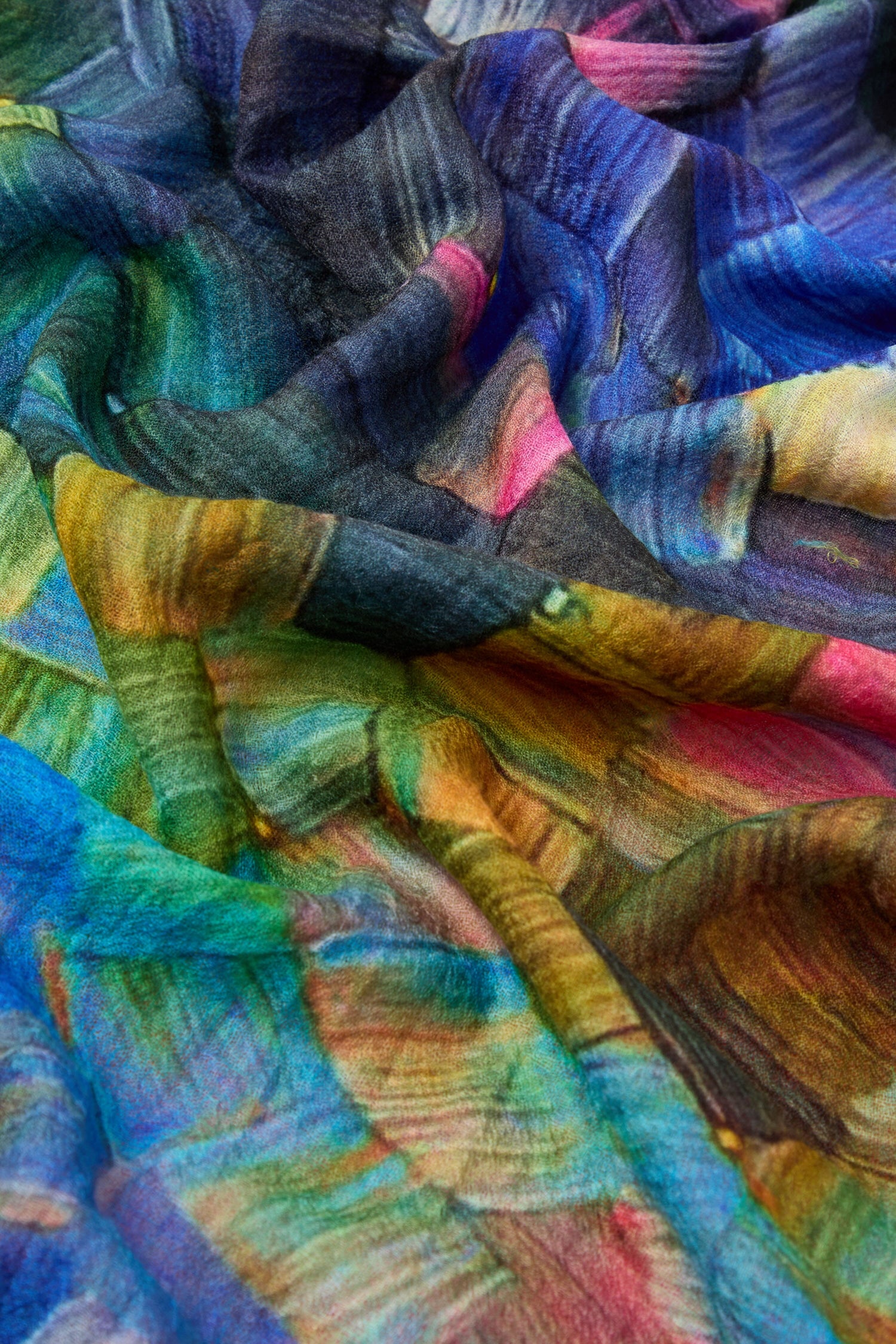 The description showcases a luxurious multi-colored accessory, a Painterly Woollen Scarf.