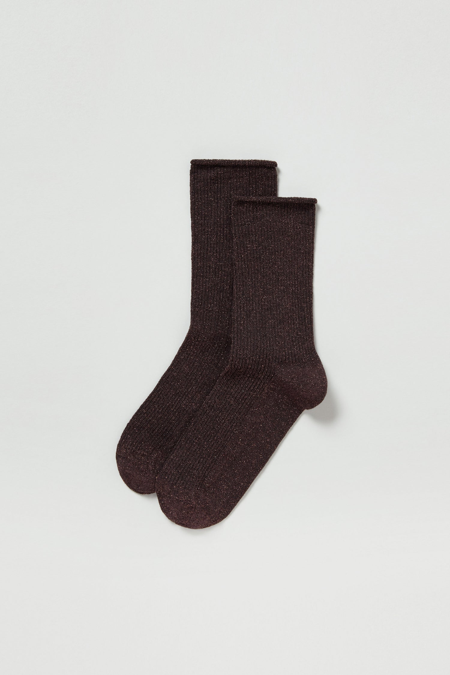 A pair of Bamboo Sparkle Chocolate Socks in dark brown with a ribbed texture is displayed on a white background.