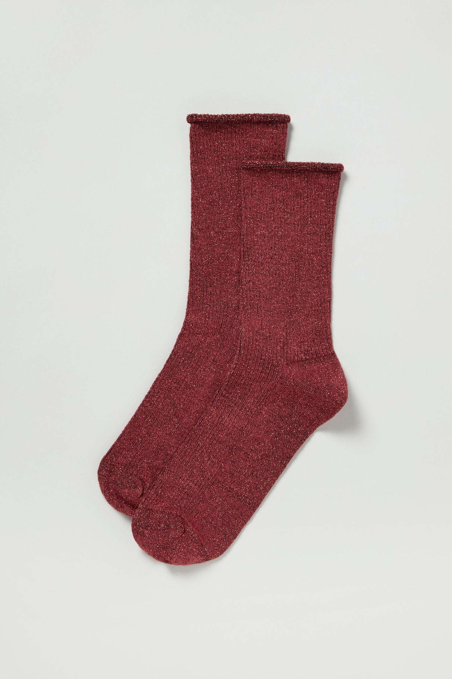 A pair of Bamboo Sparkle Red Socks is laid side by side on a white background.