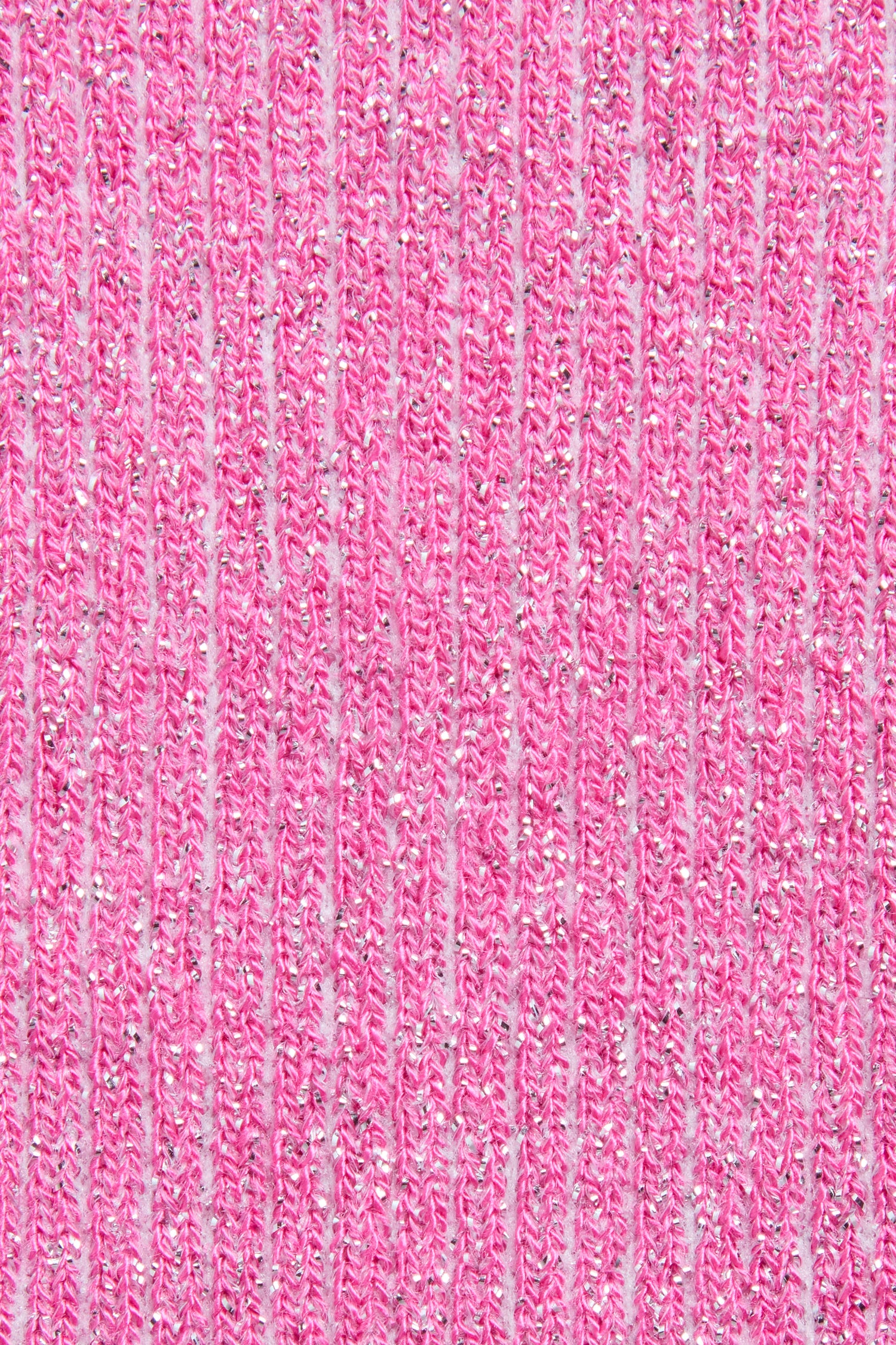Close-up of the Bamboo Sparkle Fuchsia Socks, featuring textured ribbed pink fabric with woven silver metallic threads for a shimmering effect.