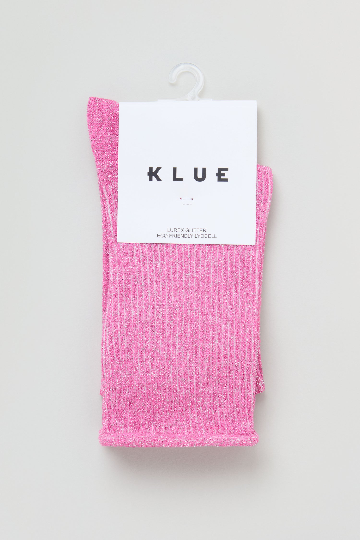 Bamboo Sparkle Fuchsia Socks: Pink shimmer socks with a glittery ribbed texture, packaged with a white "KLUE" label and displayed on a plastic hook.