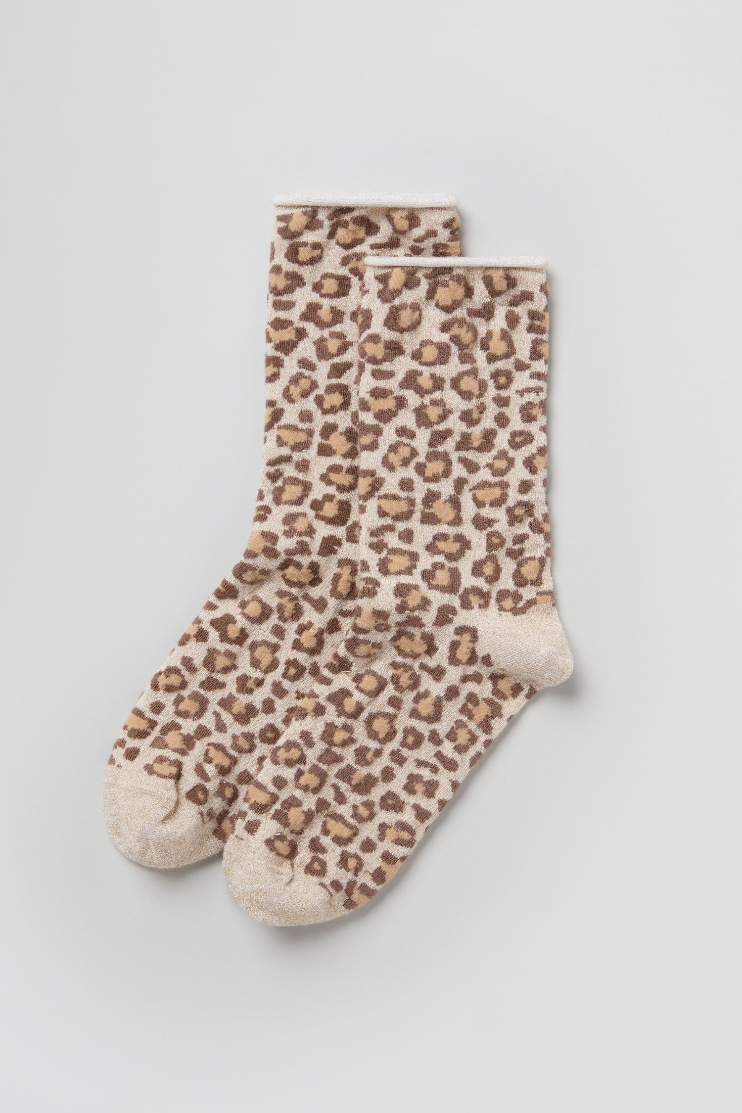 Bamboo Leopard Print Socks in beige feature a brown and tan leopard pattern, shown laid flat on a light background.