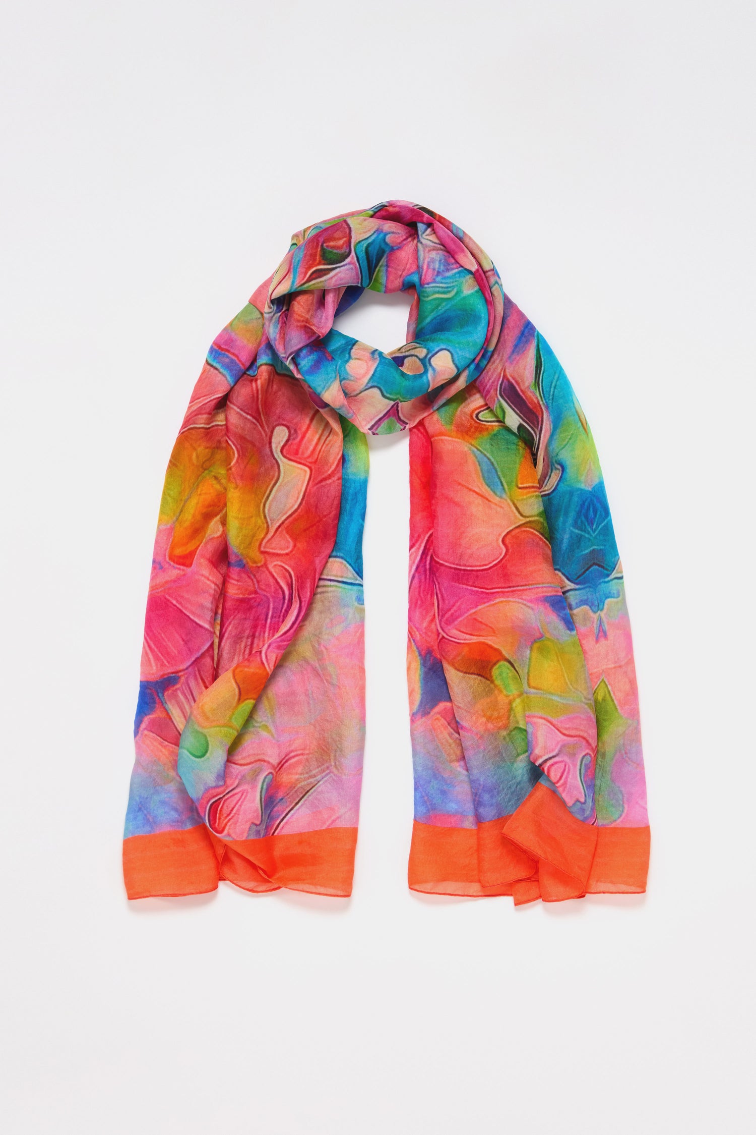 Tiffany Lamp Silk Scarf in luxurious silk, showcases abstract patterns inspired by Tiffany lamps, with vibrant pink, blue, green, and orange tones against a white background.