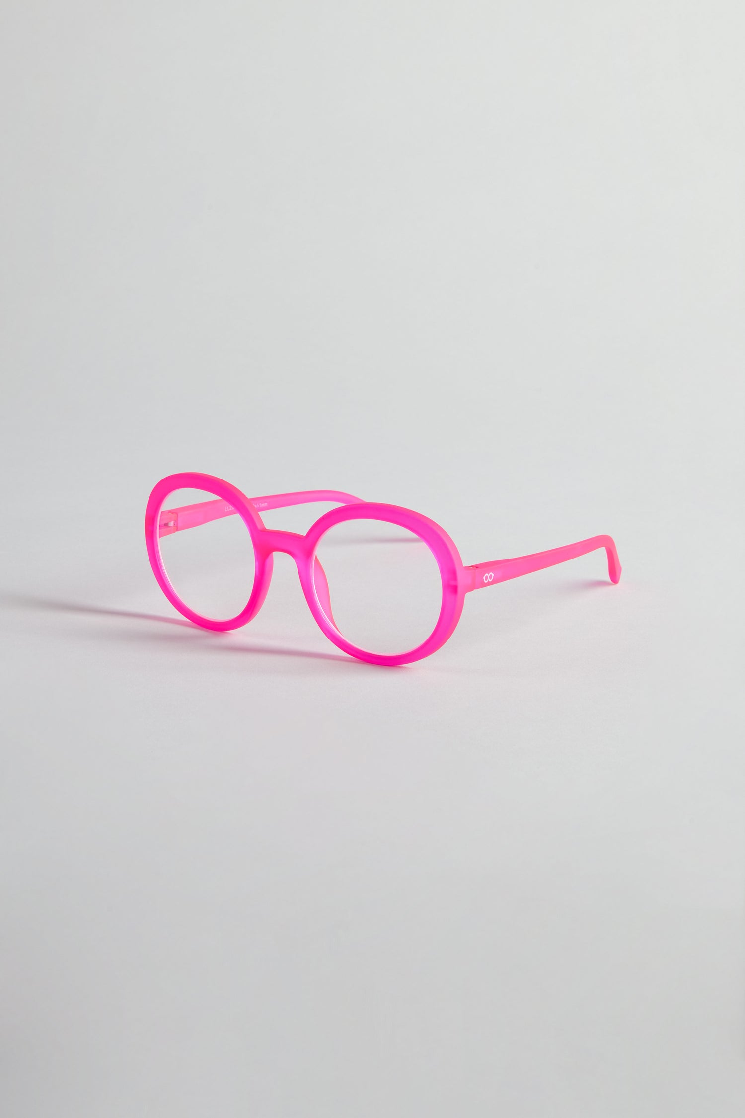Neon Pink Round Reading Glasses featuring optician-quality lenses, shown on a plain white background.