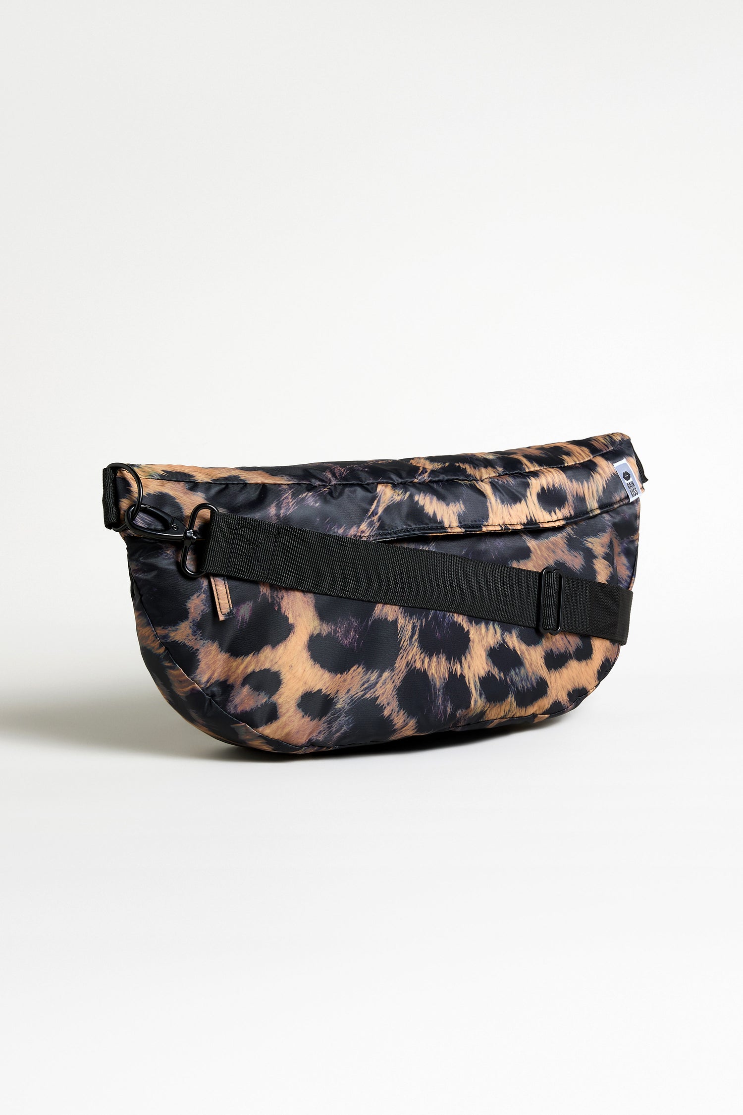 The Dark Leopard Cross Body Bag features a dark leopard print, black adjustable strap, and water-repellent material, shown against a plain white background.
