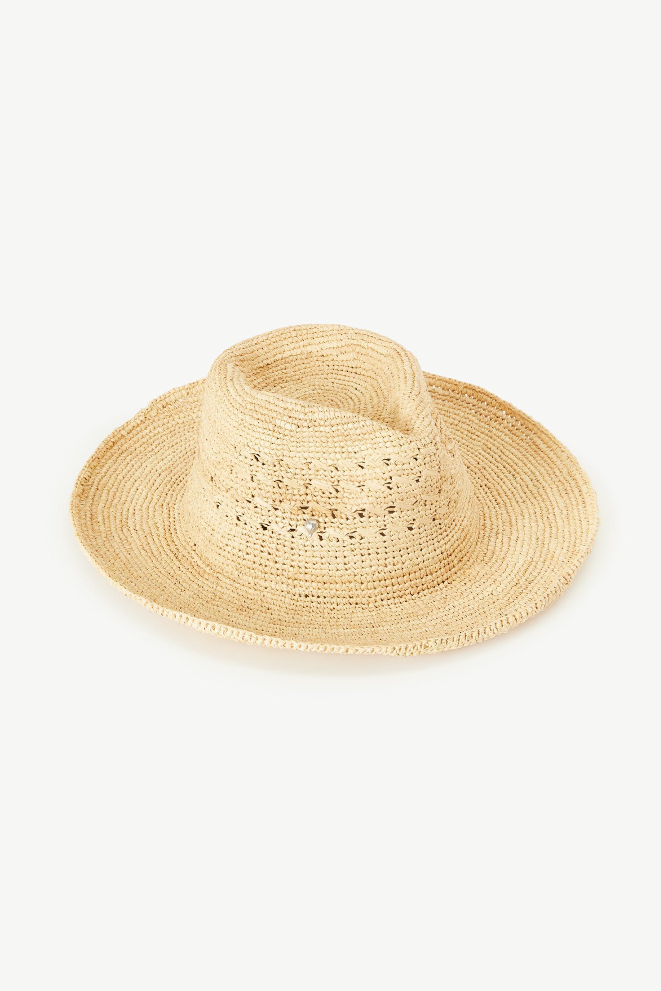 The Chapeau Westosia is a beige woven straw sun hat with a wide brim, slightly indented crown, and subtle openwork pattern—offering a lightweight, breathable summer style with close weave detailing for comfort.