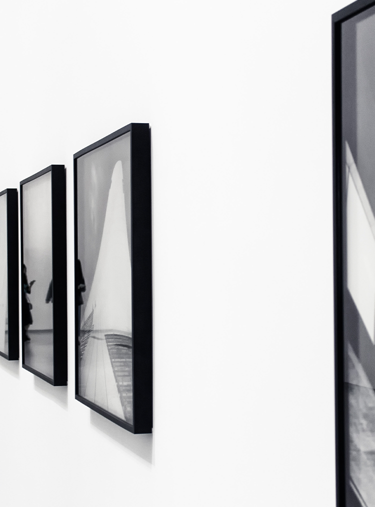 black and white paintings on a wall