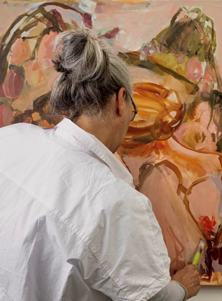 woman painting an abstract painting