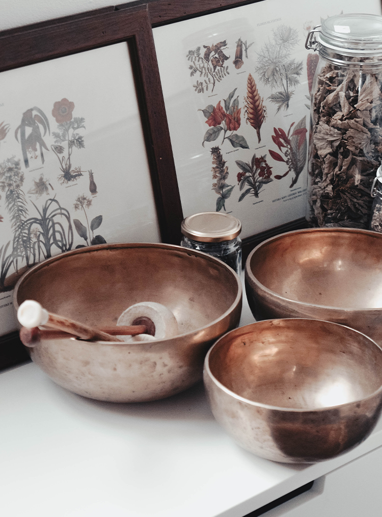 bronze metal bowls with photos in frames