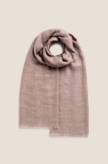 The Sparkle Scarf, a folded brown soft wool-mix accessory with a gentle texture, is displayed on a neutral background, showcasing its subtle sophistication.