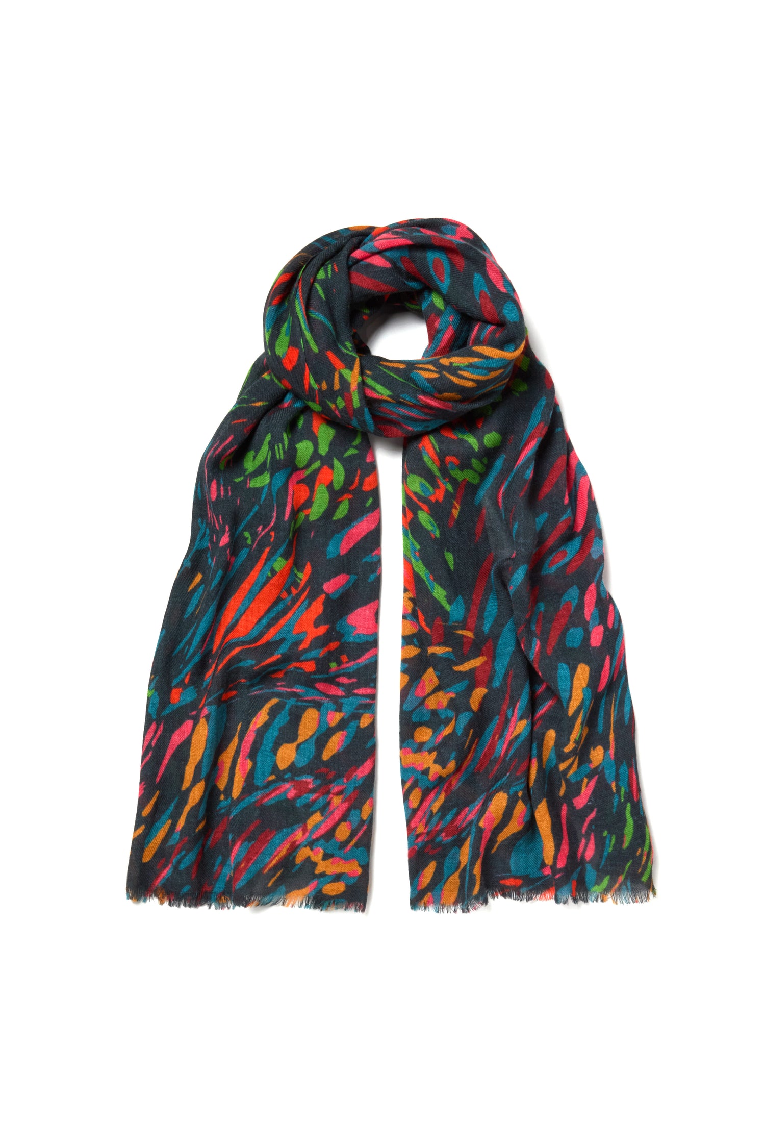 The Skyfire Scarf, crafted from black wool and silk, features a striking multicolored abstract pattern in red, orange, green, and blue—displayed flat with one end looped for a standout statement.