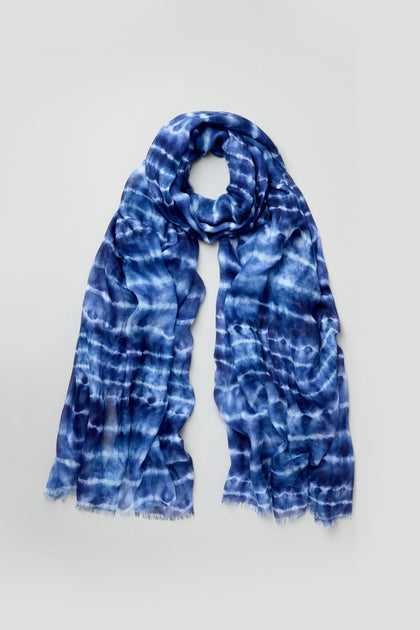 Tie Dye Print Scarf in blue and white modal silk with fringed edges, displayed flat on a plain light background.
