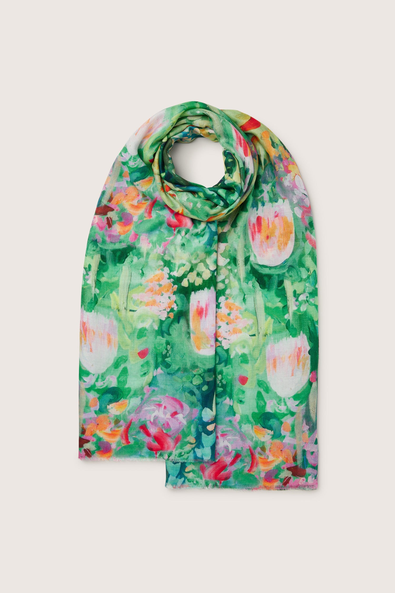 An elegant Monet's Garden Modal Silk Scarf with a floral print.