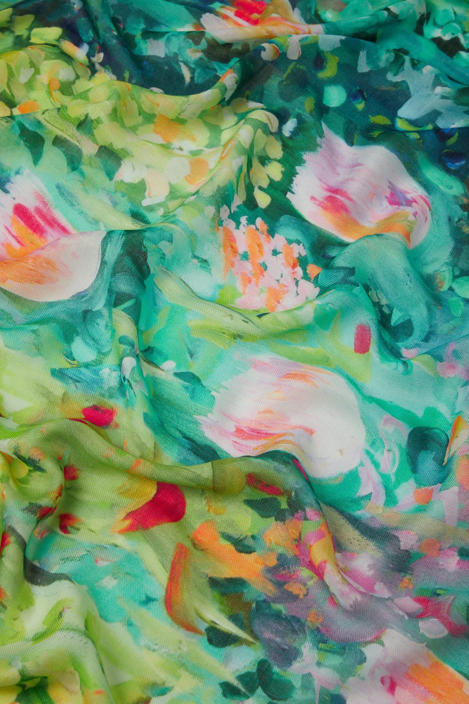 An elegant Monet's Garden Modal Silk Scarf with a floral print, offering luxurious comfort.