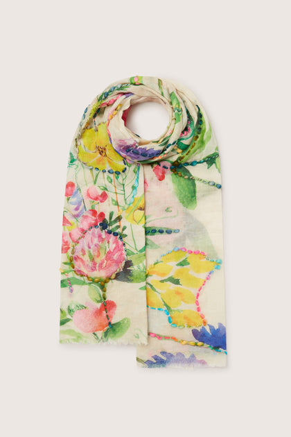 A lightweight Meadow Embroidered Scarf with a meadow design.