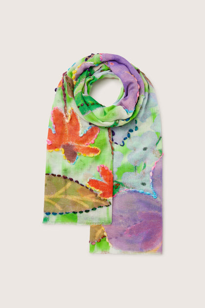 Wild Garden Embroidered Scarf with colorful flowers on it.