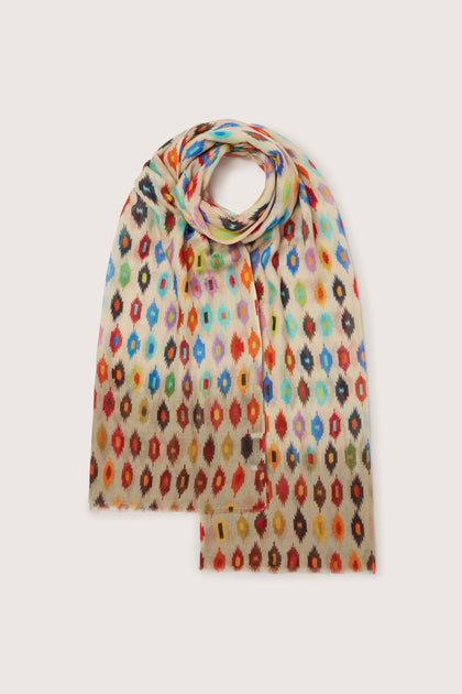 A Geometric Diamond Modal Silk Scarf that exudes elegance with its multicolored design.