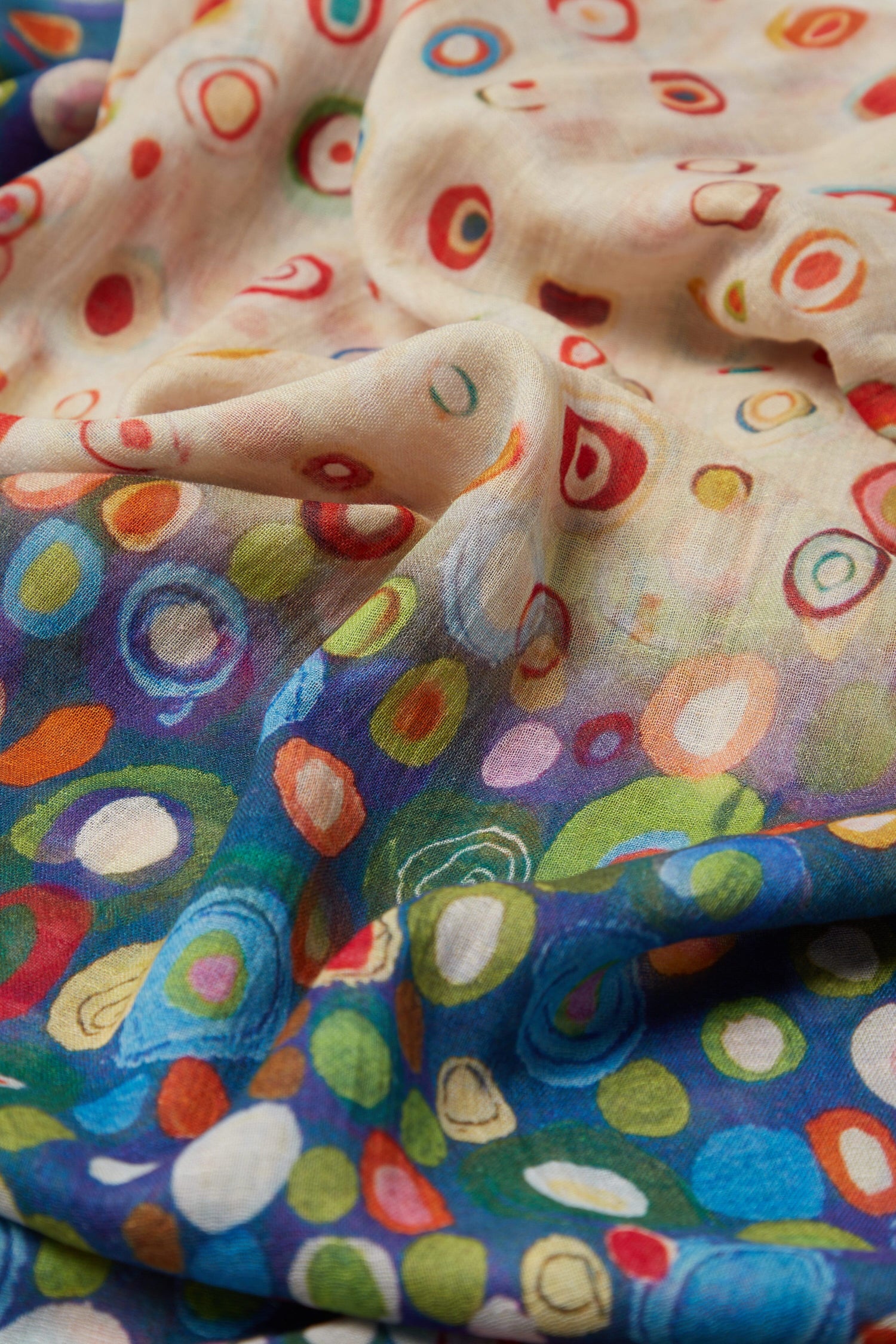 A statement Kandinsky Circle Print Scarf with an artful flair featuring Kandinsky circle prints.