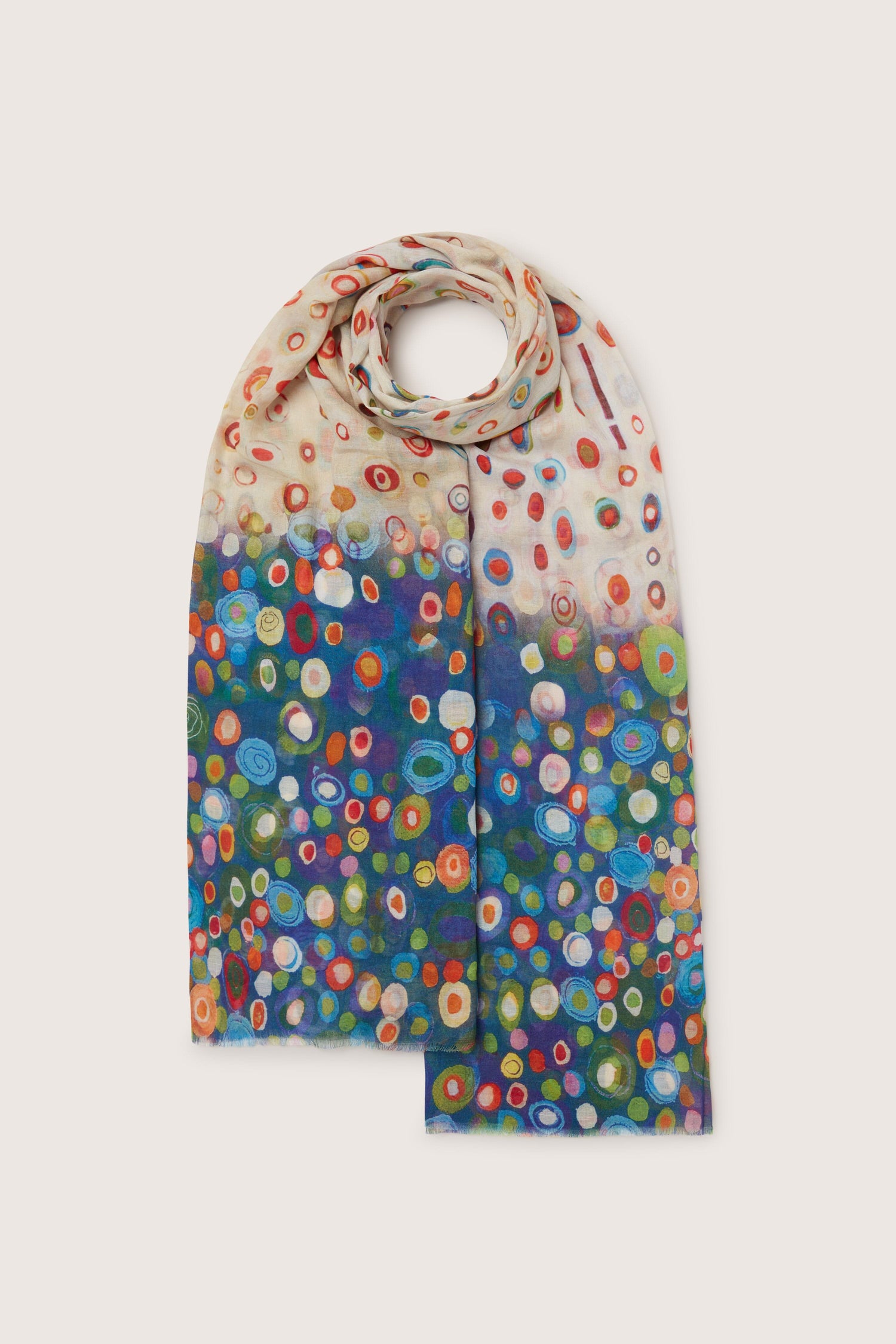 The Kandinsky Circle Print Scarf adds an artful flair to any outfit with its colorful circles, making the Kandinsky Circle Print Scarf a statement piece.