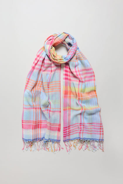 The Blue Check Stitch Cotton Scarf is a lightweight cotton accessory with pastel plaid in pink, blue, yellow, and orange, delicate check stitch details, and fringed edges—perfect for versatile styling on any occasion.