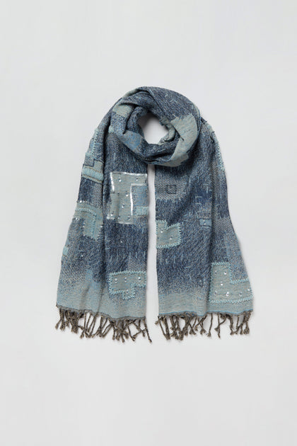 Etched Patchwork Sequin Wool Scarf in blue, showcasing a striking geometric patchwork design with subtle sequin accents and fringed ends, displayed against a plain white background.