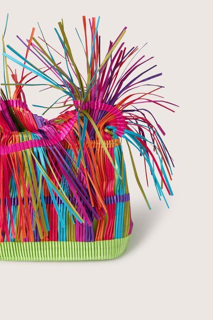 A versatile Pleated Handbag with colorful fringes.