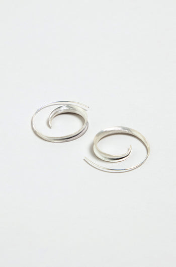 The Silver Swirl Earrings are displayed on a plain white background.