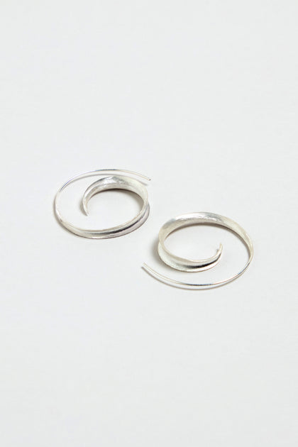 The Silver Swirl Earrings are displayed on a plain white background.