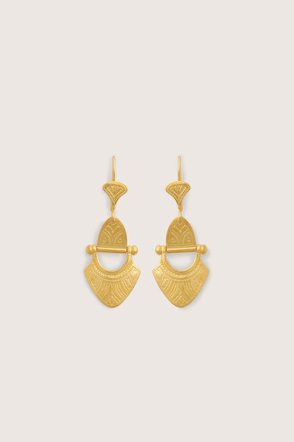 A pair of Engraved Gold Vermeil Tuareg Earrings displayed on a white background.