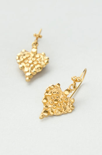 Gold Vermeil Heart Earrings featuring a textured, organic surface and drop design, showcased against a light background.
