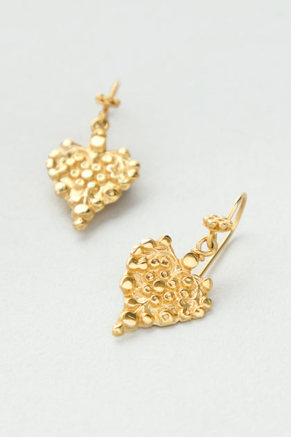 Gold Vermeil Heart Earrings featuring a textured, organic surface and drop design, showcased against a light background.