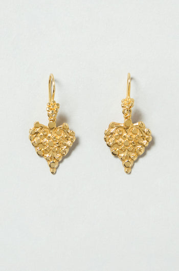 Gold Vermeil Heart Earrings featuring textured, floral-inspired detailing and a heart-shaped drop design, shown against a light background.