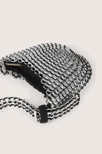 Handcrafted in Brazil, the Bellani Small Bottletop Handbag features a signature chainmail design against a white background.