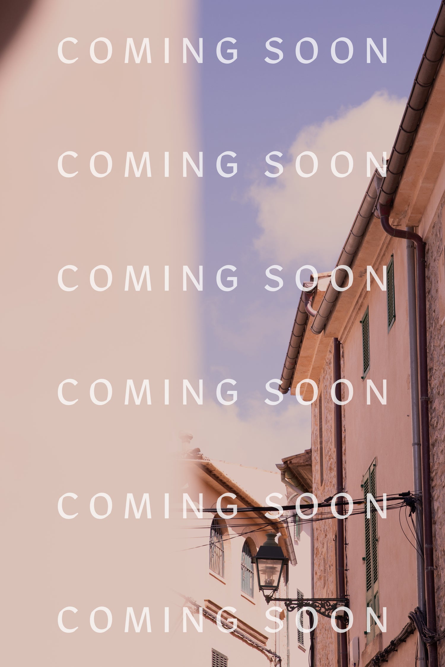 An image of a longline silhouette building with the words "coming soon" on a Fluid Twill Relaxed Shirt.