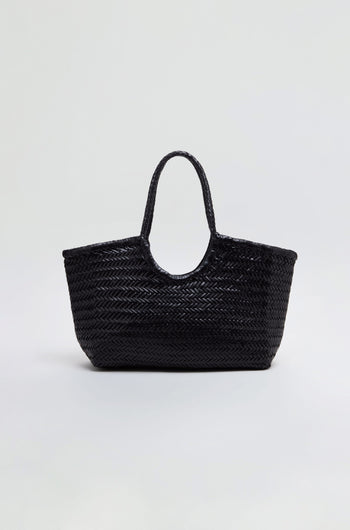 Nantucket Woven Black Leather Bag with two handles, expertly crafted from handwoven buffalo calf leather, displayed against a plain light gray background.