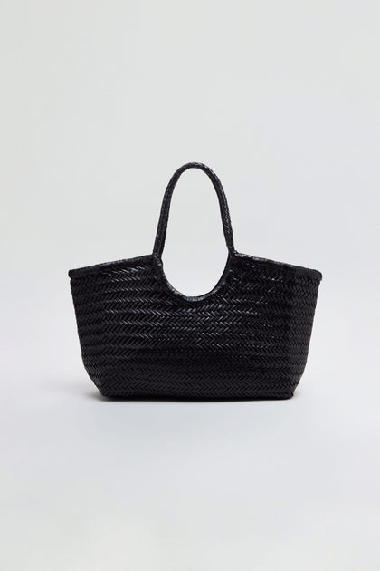 Nantucket Woven Black Leather Bag with two handles, expertly crafted from handwoven buffalo calf leather, displayed against a plain light gray background.
